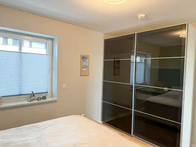 Ein Bett oder Betten in einem Zimmer der Unterkunft Haus Seehafen Apartment 2 3