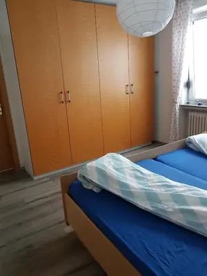 Ein Bett oder Betten in einem Zimmer der Unterkunft Ferienhaus Leuchtturm - b66088