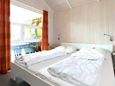 Ein Bett oder Betten in einem Zimmer der Unterkunft 12 person holiday home in Otterndorf