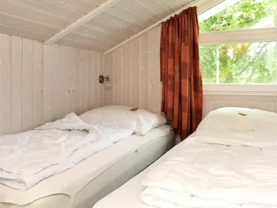 Ein Bett oder Betten in einem Zimmer der Unterkunft 12 person holiday home in Otterndorf