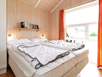 Ein Bett oder Betten in einem Zimmer der Unterkunft 4 person holiday home in Otterndorf
