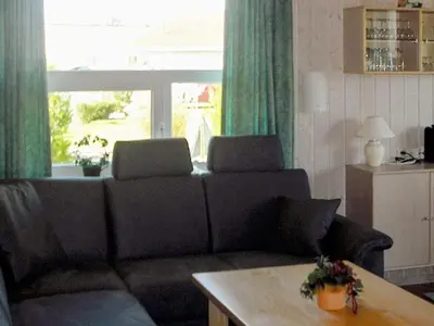 Ein Sitzbereich in der Unterkunft 6 person holiday home in Otterndorf