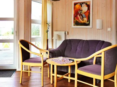 Ein Sitzbereich in der Unterkunft 12 person holiday home in Otterndorf
