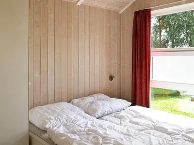 Ein Bett oder Betten in einem Zimmer der Unterkunft 12 person holiday home in Otterndorf