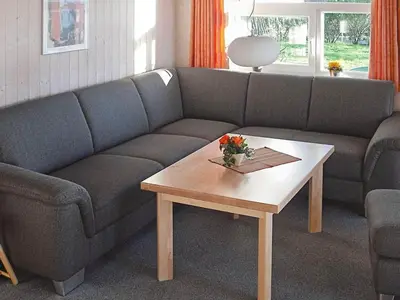Ein Sitzbereich in der Unterkunft 6 person holiday home in Otterndorf