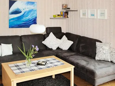 Ein Sitzbereich in der Unterkunft Waterfront holiday home in Otterndorf