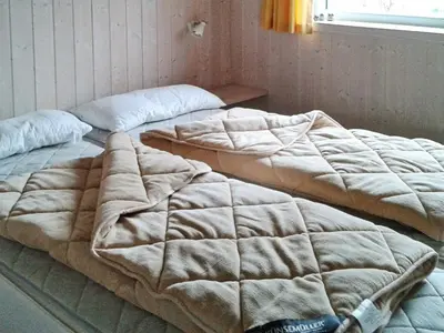 Ein Bett oder Betten in einem Zimmer der Unterkunft 6 person holiday home in Otterndorf