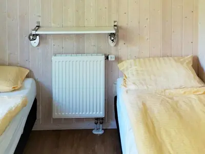 Ein Bett oder Betten in einem Zimmer der Unterkunft 4 person holiday home in Otterndorf