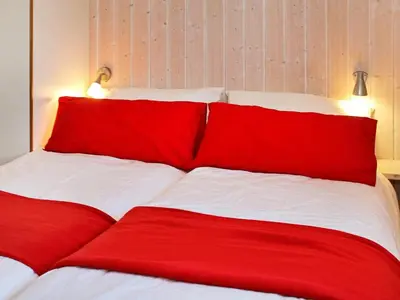 Ein Bett oder Betten in einem Zimmer der Unterkunft 12 person holiday home in Otterndorf