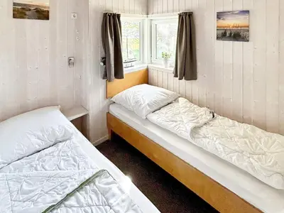 Ein Bett oder Betten in einem Zimmer der Unterkunft 6 person holiday home in Otterndorf