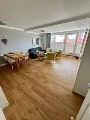 Ein Sitzbereich in der Unterkunft Naturdüne ND 8, Meerblick mit Balkon