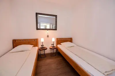 Ein Bett oder Betten in einem Zimmer der Unterkunft Naturdüne ND 8, Meerblick mit Balkon