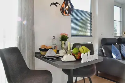 Ein Sitzbereich in der Unterkunft Meeresleuchten Duhner Entrée - 8