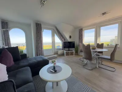 Ein Sitzbereich in der Unterkunft Haus Nordseeperle 11