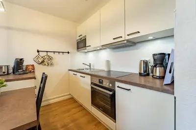Küche/Küchenzeile in der Unterkunft De Wisch - Frisch renovierte Wohnung direkt am Deich