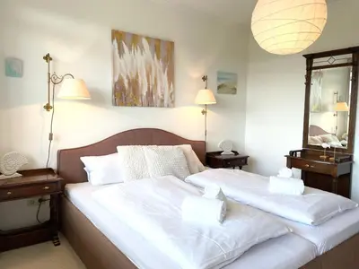 Ein Bett oder Betten in einem Zimmer der Unterkunft Apartmenthaus Frauenpreiss FeWo 308