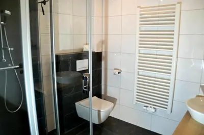Ein Badezimmer in der Unterkunft Meeresleuchten Duhnen-Entrée 19