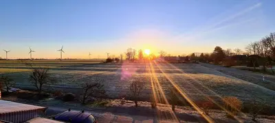 Blick auf den Sonnenuntergang/Sonnenaufgang von der Ferienwohnung aus oder aus der Nähe