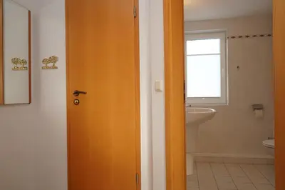 Ein Badezimmer in der Unterkunft Kurpark Domizil 3