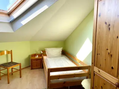 Ein Bett oder Betten in einem Zimmer der Unterkunft Ferienhaus Bach