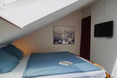 Ein Bett oder Betten in einem Zimmer der Unterkunft Haus Strandflieder