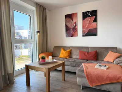 Ein Sitzbereich in der Unterkunft Ferienwohnung de Roggenbloom