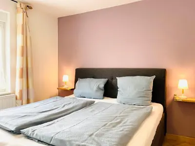 Ein Bett oder Betten in einem Zimmer der Unterkunft Villa Seestern