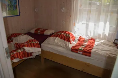 Ein Bett oder Betten in einem Zimmer der Unterkunft Ferienhaus Ausmina