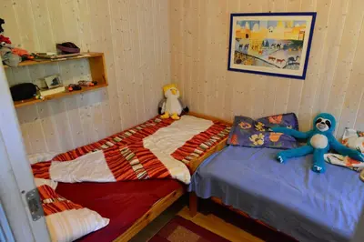 Ein Bett oder Betten in einem Zimmer der Unterkunft Ferienhaus Ausmina