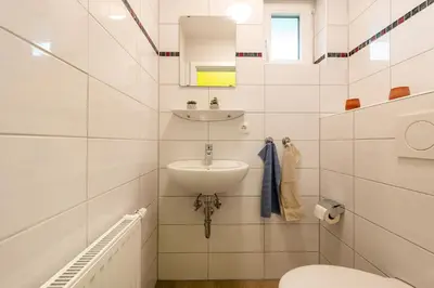 Ein Badezimmer in der Unterkunft Ferienhaus Mellumplate 04