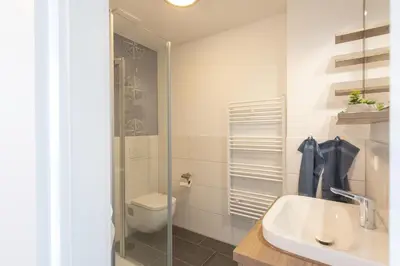 Ein Badezimmer in der Unterkunft Ferienreihenhaus 