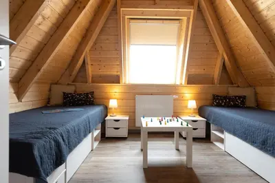 Ein Bett oder Betten in einem Zimmer der Unterkunft Ferienhaus Mellumplate 33
