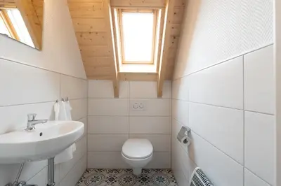 Ein Badezimmer in der Unterkunft Ferienhaus Mellumplate 33