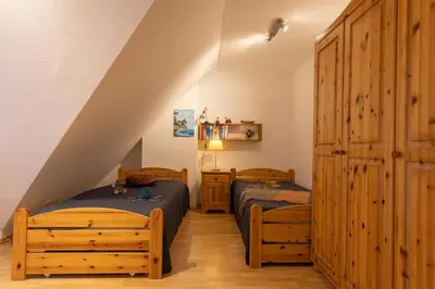 Ein Bett oder Betten in einem Zimmer der Unterkunft Appartement Sieltrift 33-32