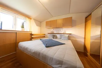 Ein Bett oder Betten in einem Zimmer der Unterkunft Ferienhaus 