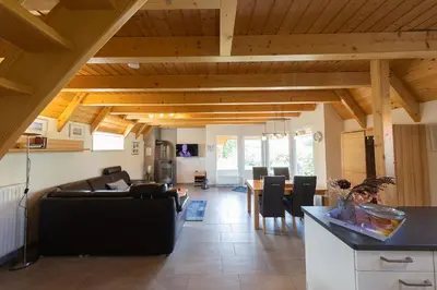 Ein Sitzbereich in der Unterkunft Ferienhaus Mellumplate 52