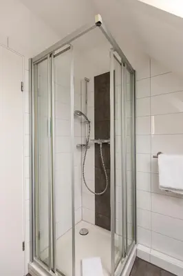Ein Badezimmer in der Unterkunft Cuxlandhotel Studio 201