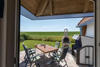 Ein Balkon oder eine Terrasse in der Unterkunft Ferienhaus 