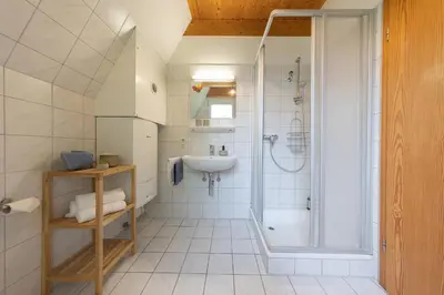 Ein Badezimmer in der Unterkunft Ferienhaus Wittsand 18