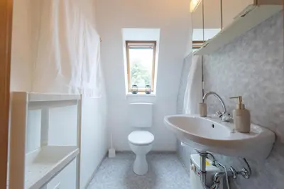 Ein Badezimmer in der Unterkunft Ferienhaus Wittsand 18