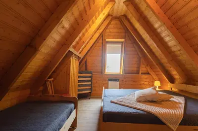 Ein Bett oder Betten in einem Zimmer der Unterkunft Ferienhaus Vogelsand 07