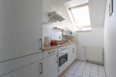 Küche/Küchenzeile in der Unterkunft Ferienwohnung Lilli Marleen 3-33