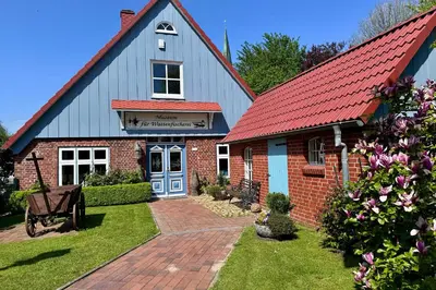 Ein Garten an der Unterkunft Ferienhaus Lale Andersen 26