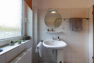 Ein Badezimmer in der Unterkunft Ferienwohnung Lilli Marleen 7-03