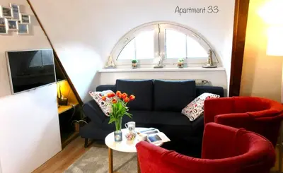 Ein Sitzbereich in der Unterkunft Appartement Achtern Diek 2-33