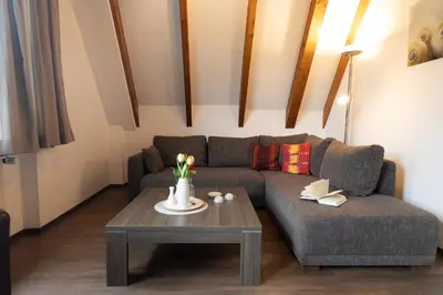 Ein Sitzbereich in der Unterkunft Appartement Achtern Diek 2-29