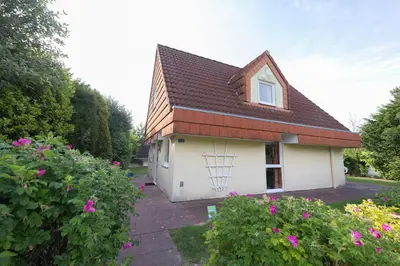 Ein Garten an der Unterkunft Ferienhaus Vogelsand 10
