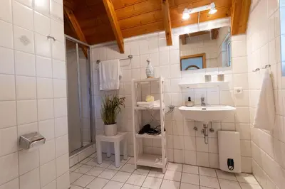 Ein Badezimmer in der Unterkunft Ferienhaus Tegeler Rinne 06