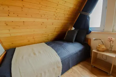 Ein Bett oder Betten in einem Zimmer der Unterkunft Ferienhaus Tegeler Rinne 02