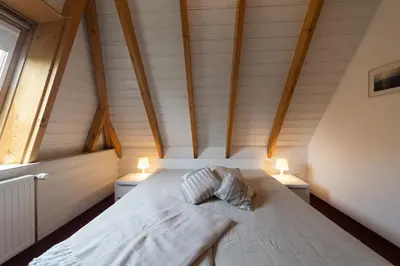 Ein Bett oder Betten in einem Zimmer der Unterkunft Ferienhaus 